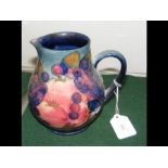 A Moorcroft 'Pomegranate and Finches' baluster jug