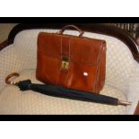 A leather gents satchel together with Burberry umb