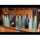 A collection of vintage glass bottles - many Isle