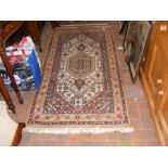 A modern Middle Eastern style rug with light brown