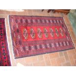 A small antique Middle Eastern rug - 120cm x 70cm
