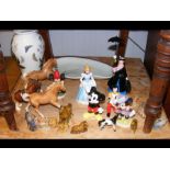 A collection of Walt Disney and other figures