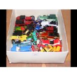 A box of Matchbox die cast vehicles