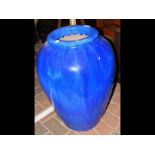 A blue glazed baluster urn