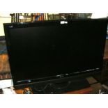 An LG 42" flat screen TV with remote