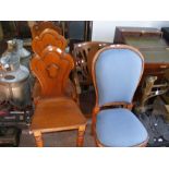 A pair of Victorian hall chairs together with two