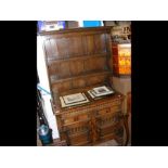 An Ipswich oak dresser, rack to back, two drawers