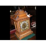 A late 19th century two train mantel clock in gilt mounted walnut case