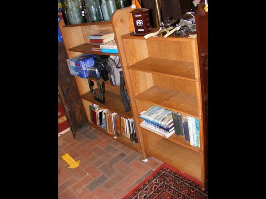 Two oak open bookcases