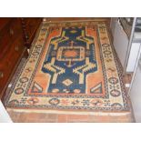 A Turkish style rug - 220cm x 130cm