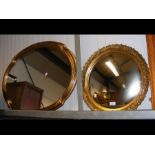 A gilt framed convex wall mirror together with one