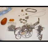 An assortment of silver jewellery, coinage, variou