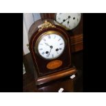 An inlaid mantel clock - 28cms high