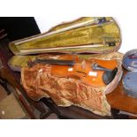 An old violin with bow in fitted carrying case