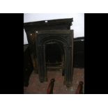 A cast metal Victorian fire surround and one other