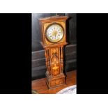 A miniature long case clock with marquetry case -