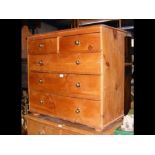 A pine chest of two short and three long drawers -