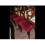 A set of five Victorian rosewood dining chairs wit