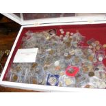 A mixed lot of UK and World coins in display case