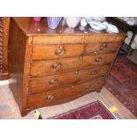 An antique chest of two short and three long gradu