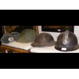 Three Second World War helmets