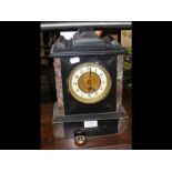 A slate and marble mantel clock with single train