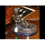 A reproduction bronzed figure of reclining nude -