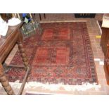 A Middle Eastern rug with geometric border - 205cm