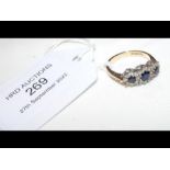 A diamond and sapphire dress ring in 9ct setting