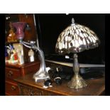 An Art Nouveau style table lamp with pink glass sh