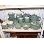 A collection of Denby tea and tableware