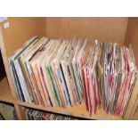 A collection of 45rpm records including The Beatle