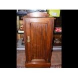 An antique pot cupboard