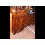 A mahogany cupboard with single drawer above - wid