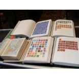 A selection of five stamp albums containing GB Que