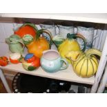 A medley of ceramic jugs, including Italian fruits