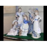A selection of Nao and Lladro figures