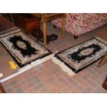 A small Chinese rug and one other