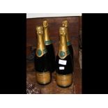Four bottles of Harrods Champagne