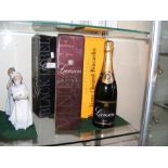 A boxed bottle of Lanson champagne together with t