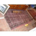 A Middle Eastern rug - 220cm x 130cm