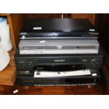 A Toshiba DVD player together with various DVD and