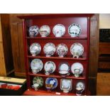 Miniature cups and saucers on display stand