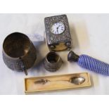 A small silver cased travelling clock, scent bottl