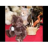 A collectable Steiff Bear with growler and basket,