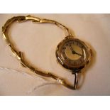 A ladies 18ct wrist watch with strap