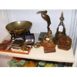 An assorted collection of metal ware, including a