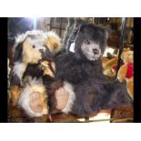 A large collectable Charlie Bear with long black f