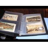 Three albums containing collectable postcards rela