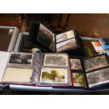 An album containing collectable old postcards rela